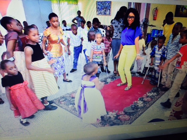 TV host Princess Halliday and physically disabled children in Africa